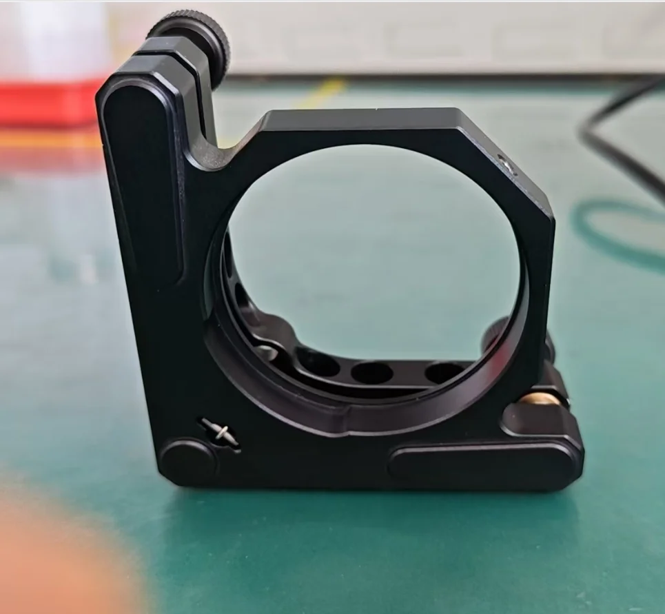 Optical adjustment bracket, capable of mounting 2-inch optical elements, with 2 differential adjusters.