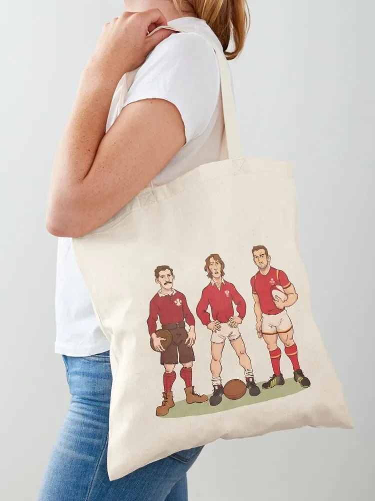 The 1988 Range: Welsh rugby icons Arthur Gould (19th Century), JPR Williams (20th Century) and Sam Warburton (21st Cent Tote Bag
