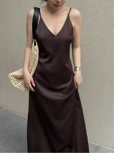 Imagen 2 del producto ETJ 2025 nueva falda elegante sexy de moda con textura brillante mini falda de color puro halter falda larga con tirantes para fiesta