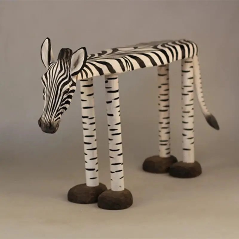 Hand-carved zebra with solid wood for shoes and benches.