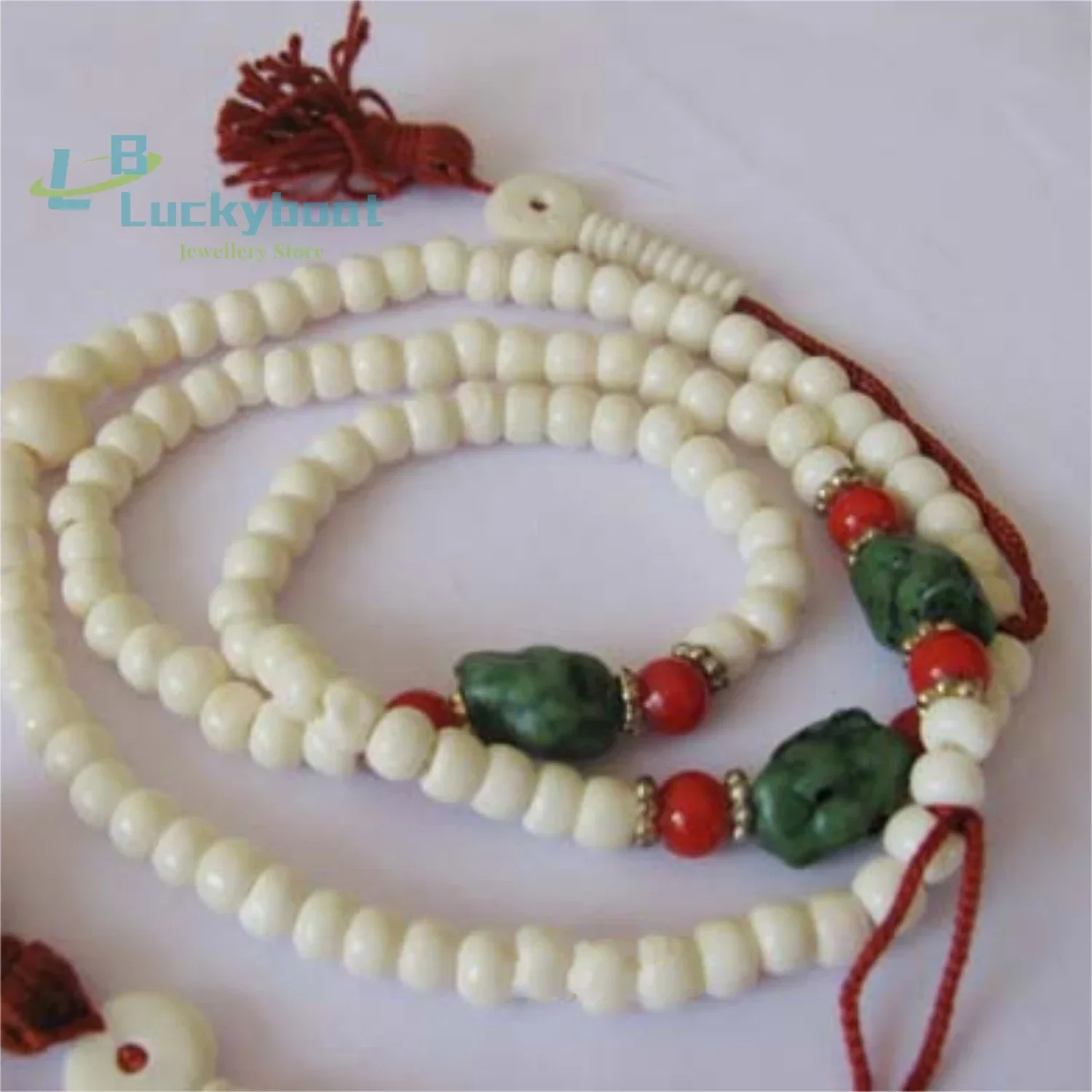 Tibetan style cow bones with 108 Buddha beads, multi loop bracelets, white cow bones, aged Nepalese men and women's necklaces