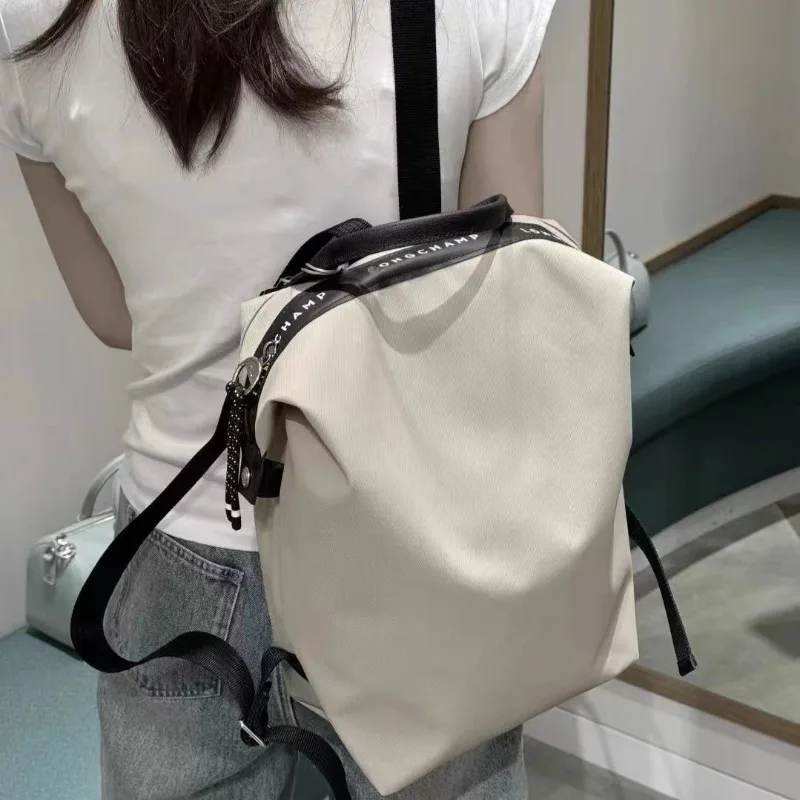 

2025 new backpack for college students, lightweight and large capacity business travel backpack for women