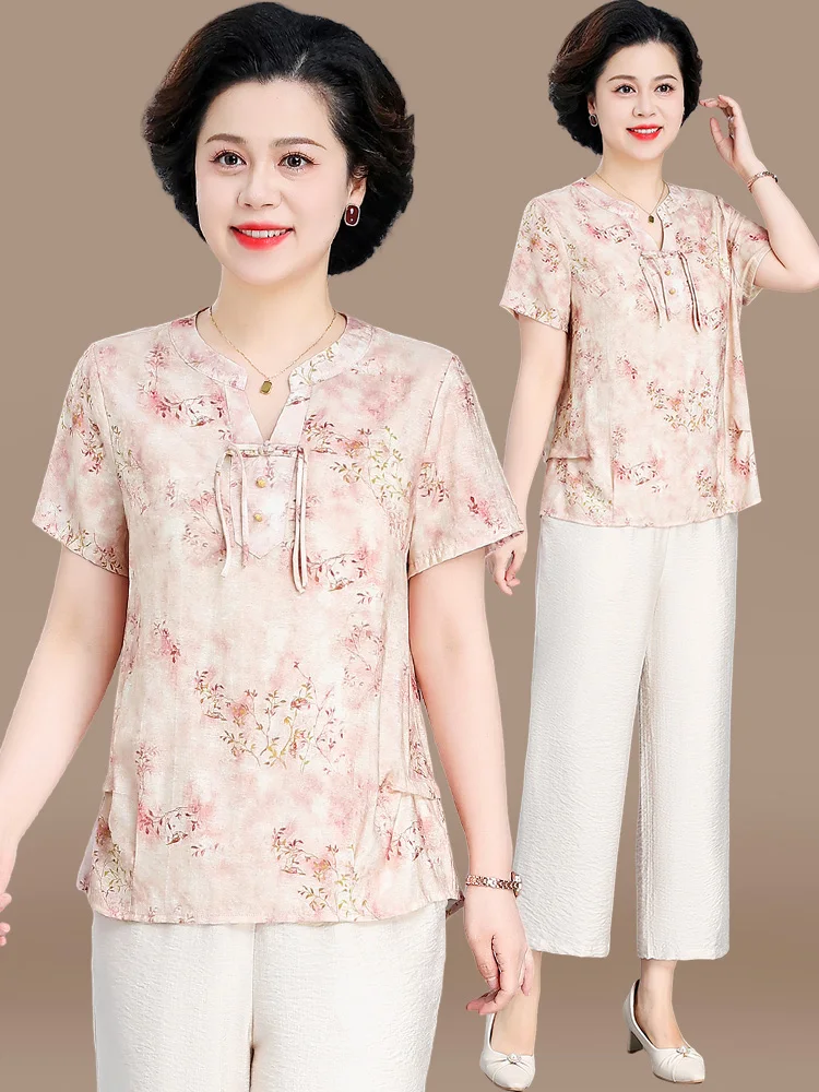 

Новый китайский летний наряд: хлопково-льняной топ с коротким рукавом и цветочным принтом для женщин среднего и старшего возраста, модный свободный крой.