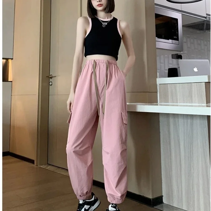 

2024 New Summer American Streetwear Minimalist Loose Versatile Casual Harem Solid Elastic Bandage Pockets Women's Cripped Pants