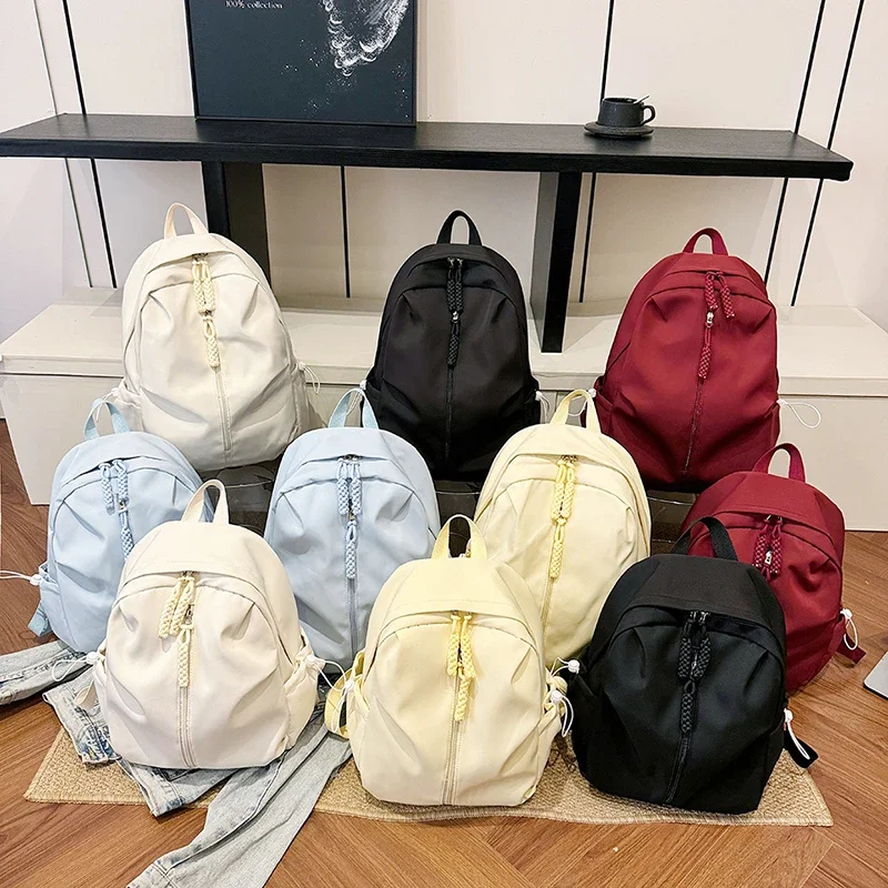 Solid Color Large Capacity Student Backpacks Nylon Zipper 2025 New Hot Sale Ladies Bags Commuting Soft Fashion Backpacks