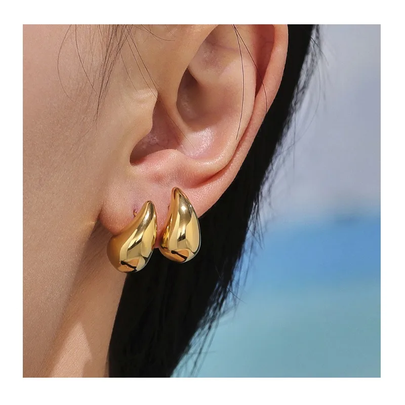 

Seattle Design Sense Hollow Small Water Drop Stud Earrings Plated Real Gold Fashion Personality Titanium Steel Jewelry Spot