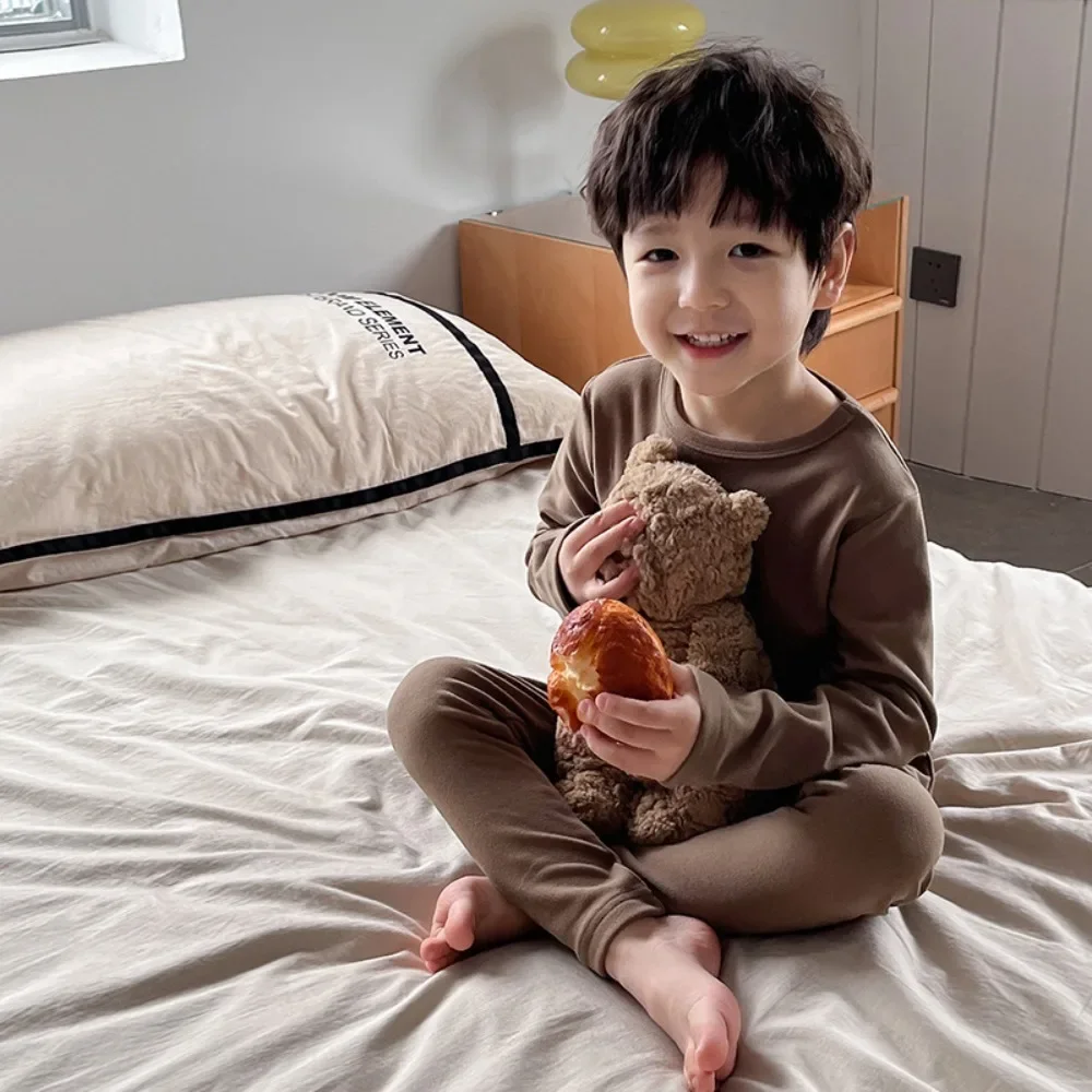 

Осенний полосатый пижамный комплект для мальчиков с принтом, корейская версия, однотонный топ с длинными рукавами, брюки, 2 предмета, повседневная детская домашняя одежда