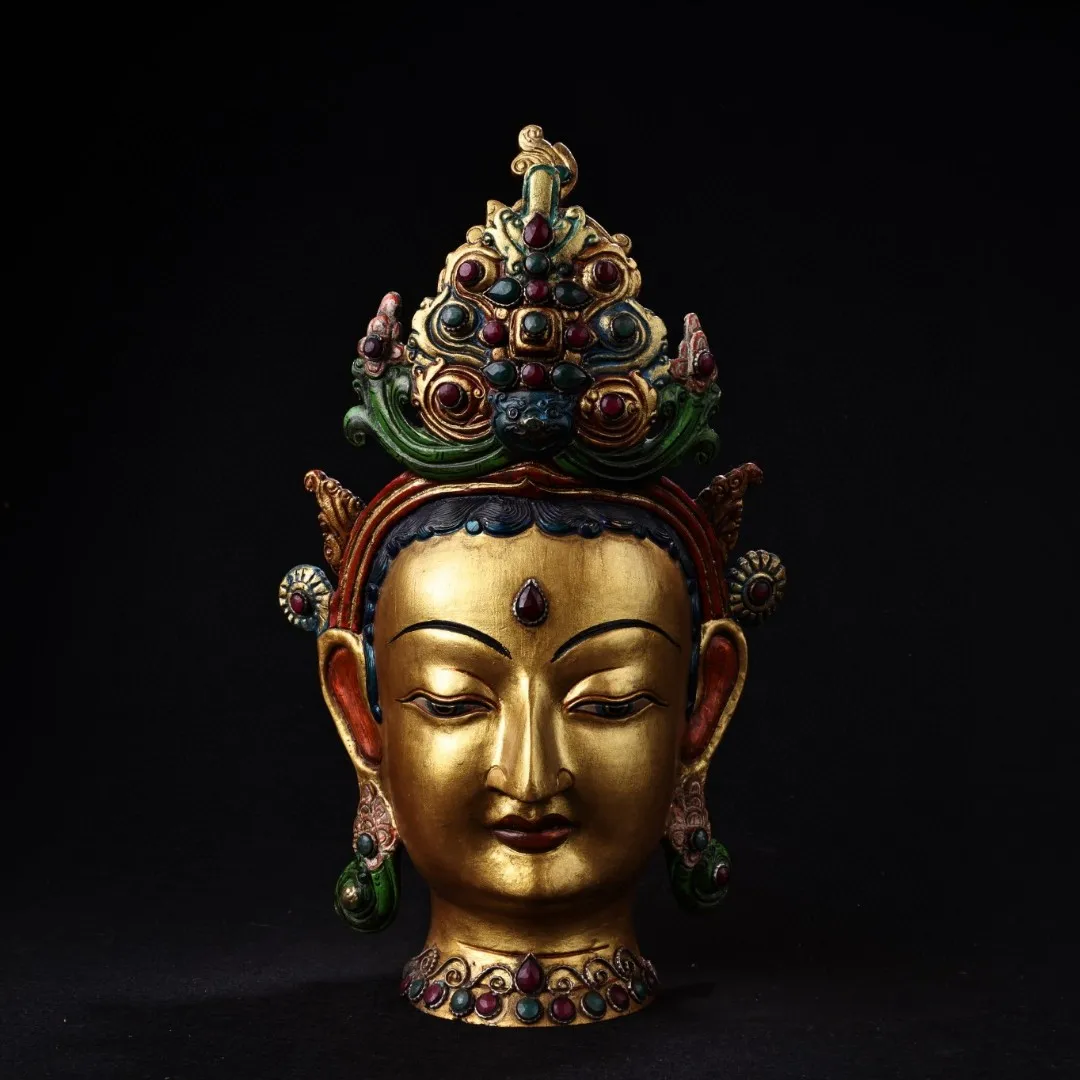 

Handmade Nepalese Tibetan pure copper inlaid with gemstones, painted with gold, and decorated with the head of Mother Buddha. Ha