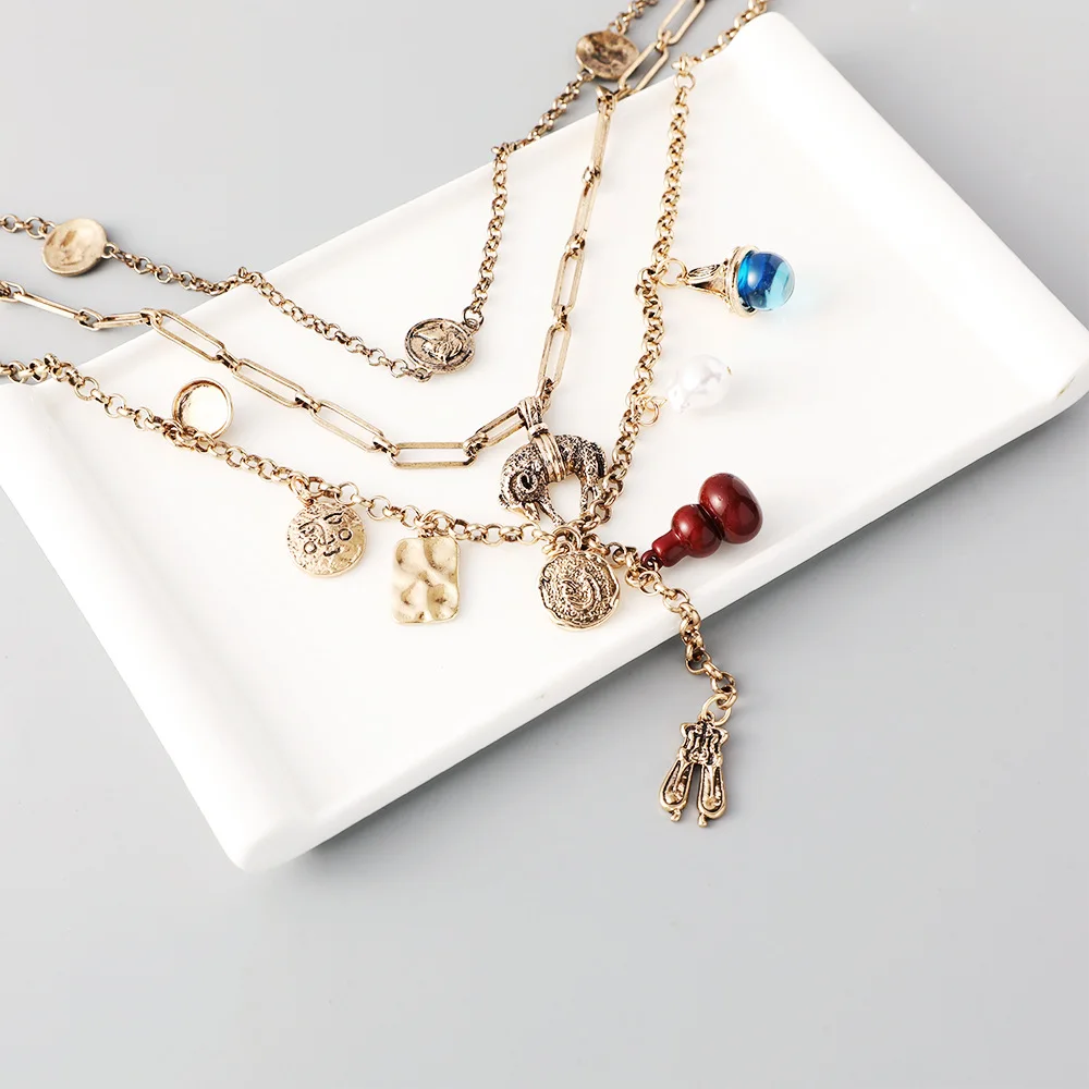 Fashion personality multi-layer stacked necklaces, retro and old multi-element trend pendants, light luxury long necklaces