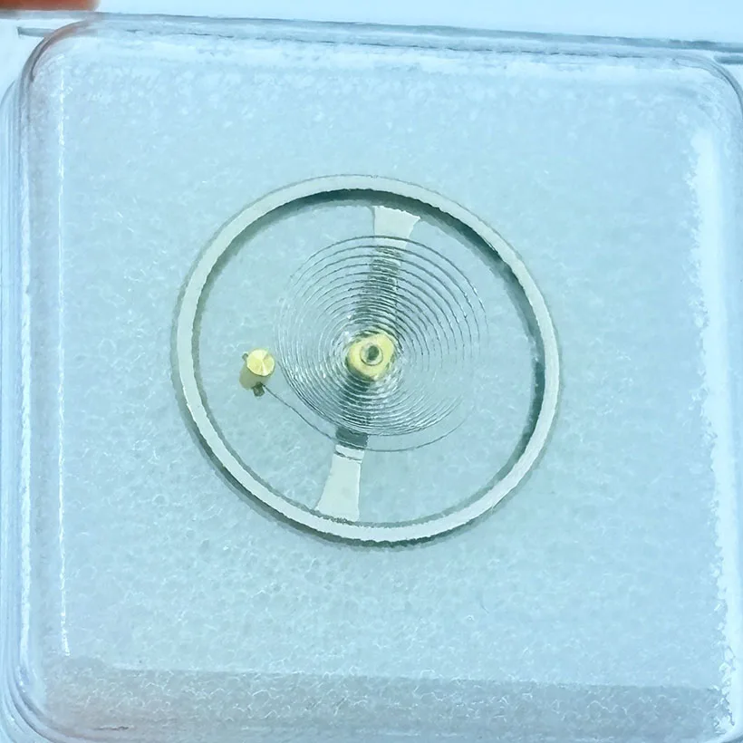 Accessoires de montre Mouvement de précision Roue d'équilibre 7009A fabriquée en Chine Roue d'équilibre 7009 Full Swing (y compris le ressort à cheveux)
