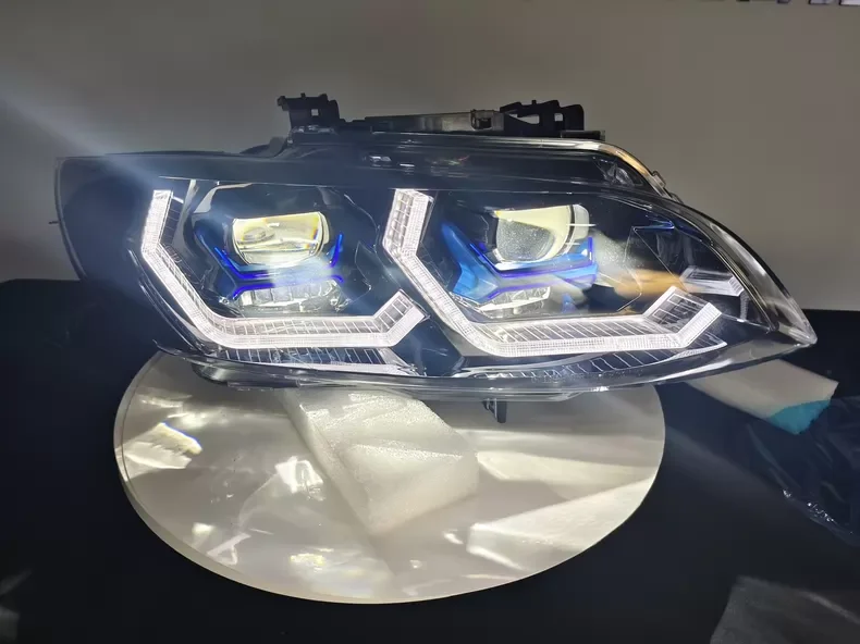 Suitable for the 2010-2013 BMW 3 Series E93 M LED headlamp assembly in a dual-color version, featuring a pair of front headlight