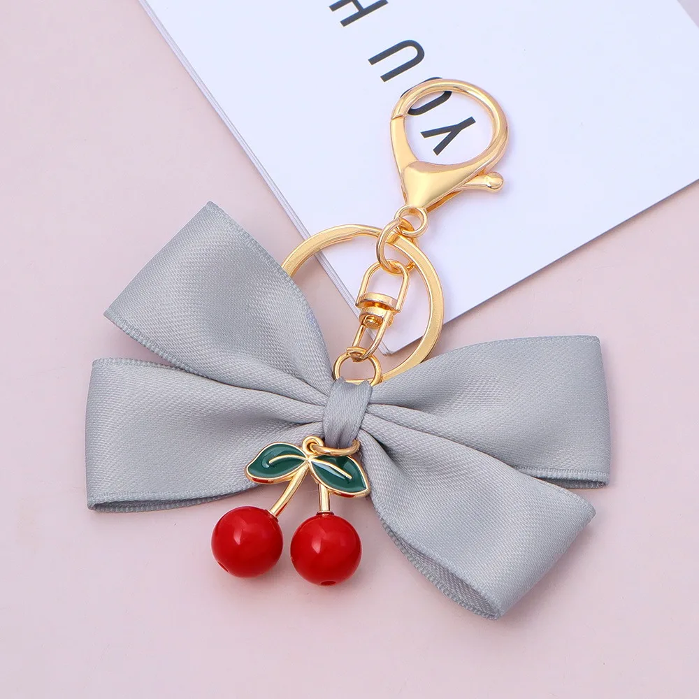 

1Pcs New with Cherry Pendant Bowknot Keychain Colorful Fabric Key Holder Handbag Ornaments DIY Accessories