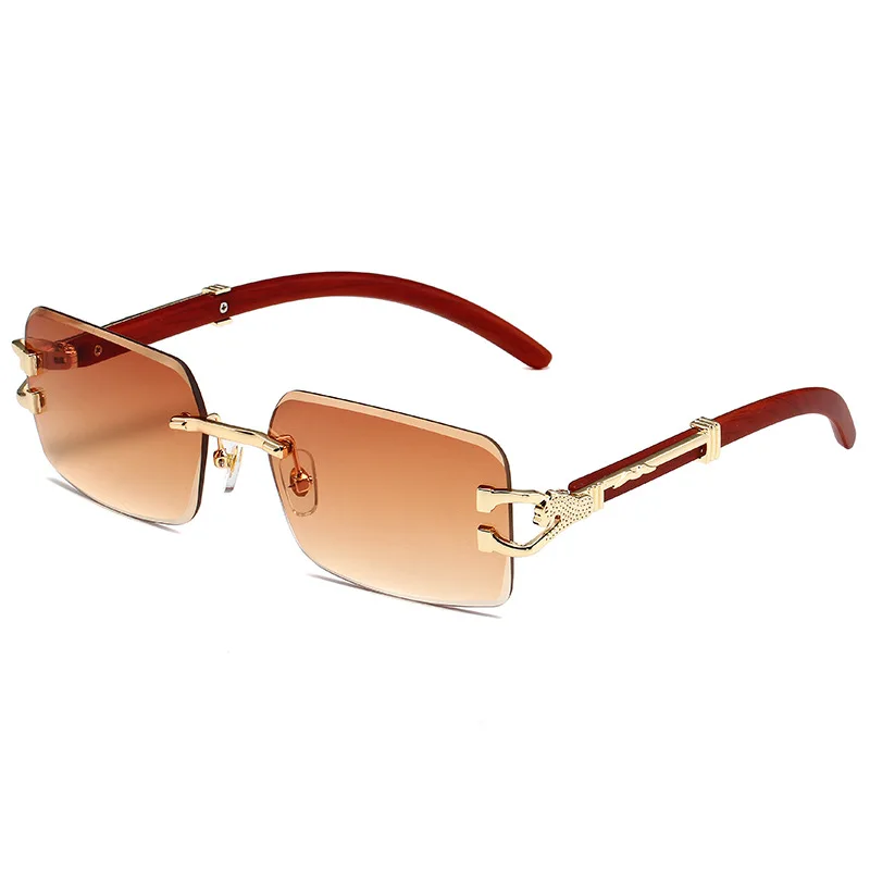 Kacamata Hitam tanpa bingkai ลายเสือดาวโลหะแนวแฟชั่นสำหรับผู้หญิงแว่นกันแดดทรงสี่เหลี่ยมไล่ระดับสีสำหรับผู้ชายและผู้หญิงเฉดสี UV400