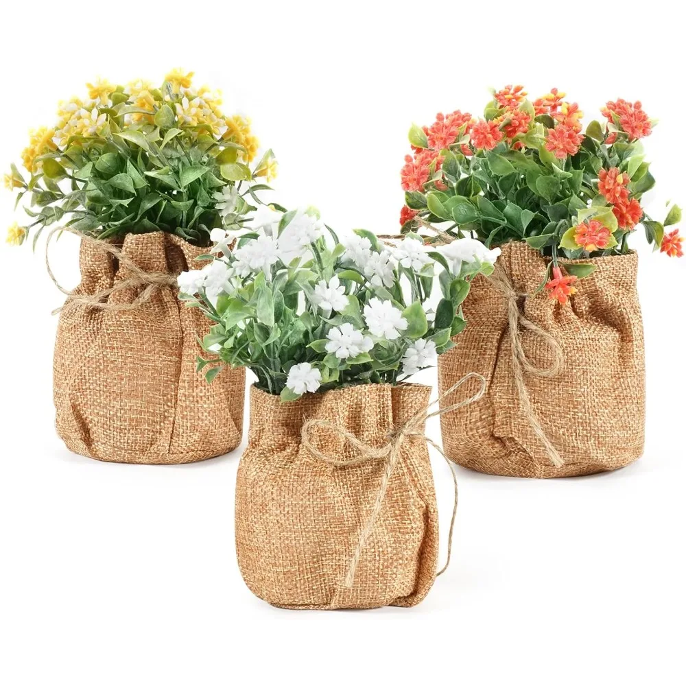 

Artificial flowers, arranged in a small burlap sack vase, 3-piece set - artificial flowers