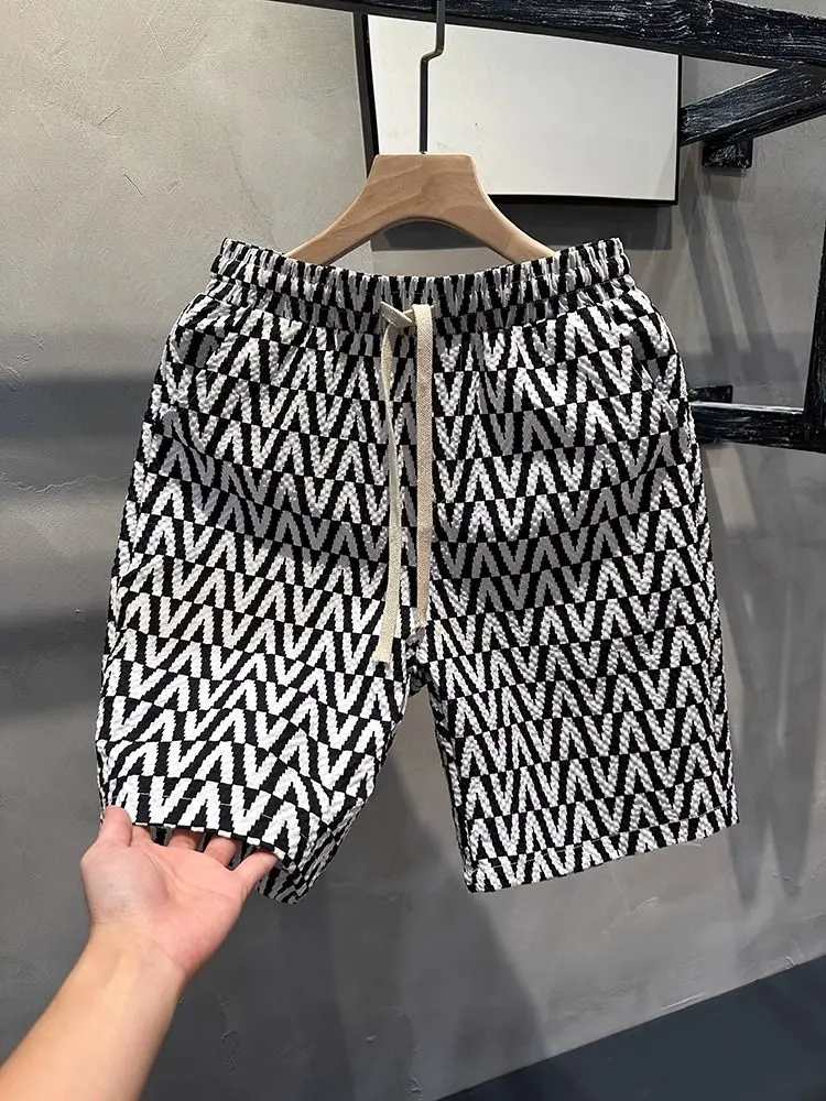 

Новые летние мужские модные повседневные брюки. Стильные и модные шорты прямого кроя. Универсальные пляжные шорты для мужчин.