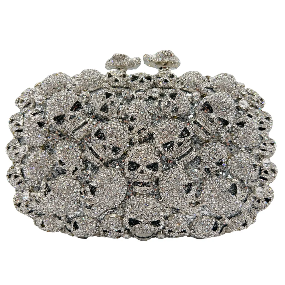 Skull crystal clutch, black rhinestone skull studs, double clasp. Edgy evening bag for Halloween, cosplay, and parties