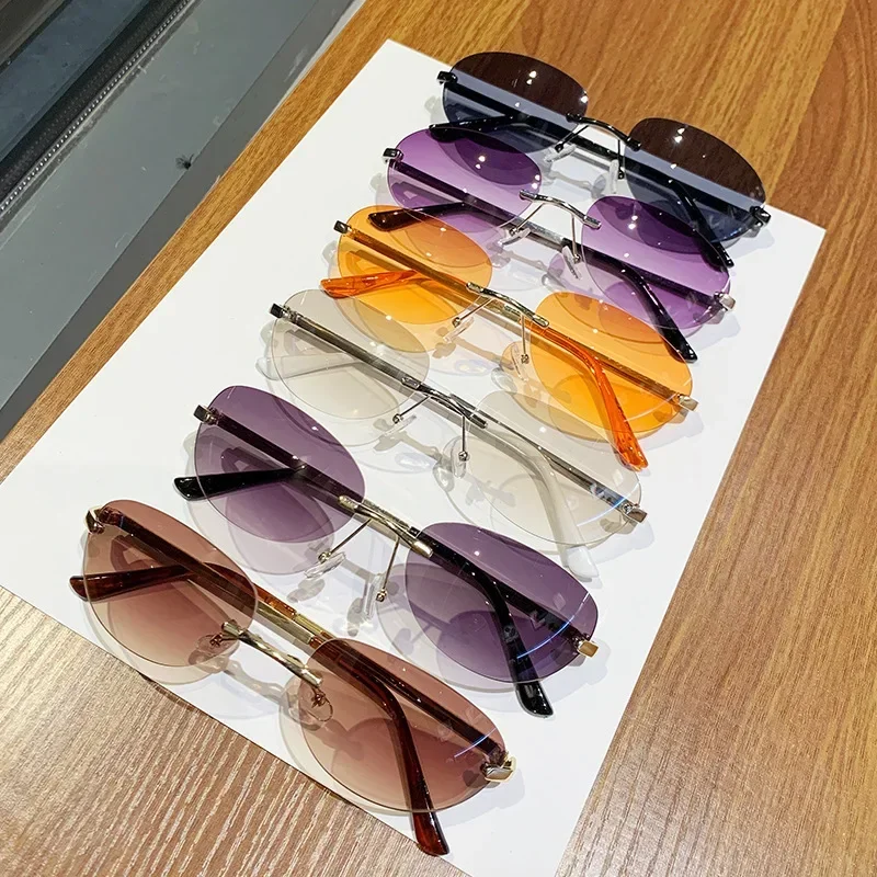

Women's Retro Fashion Luxury Brand Designer Sunglasses Unisex New Rimless Cat Eye Sunglasses Outdoor Sun Travel Essentials