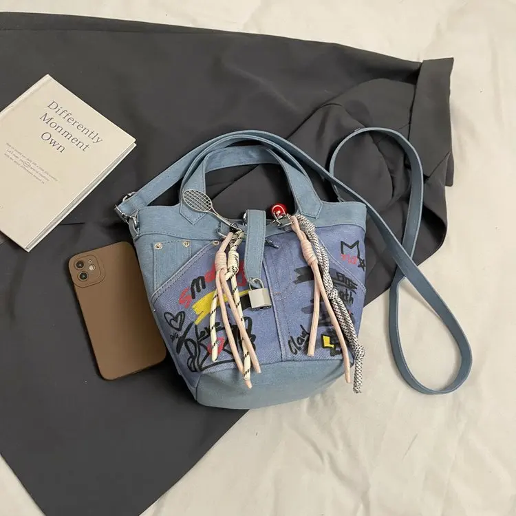 

2025 Denim Graffiti Bucket Bag Women's Artistic Paint Splatter Commuter Shoulder Bag Lightweight Crossbody + Adjustable Strap