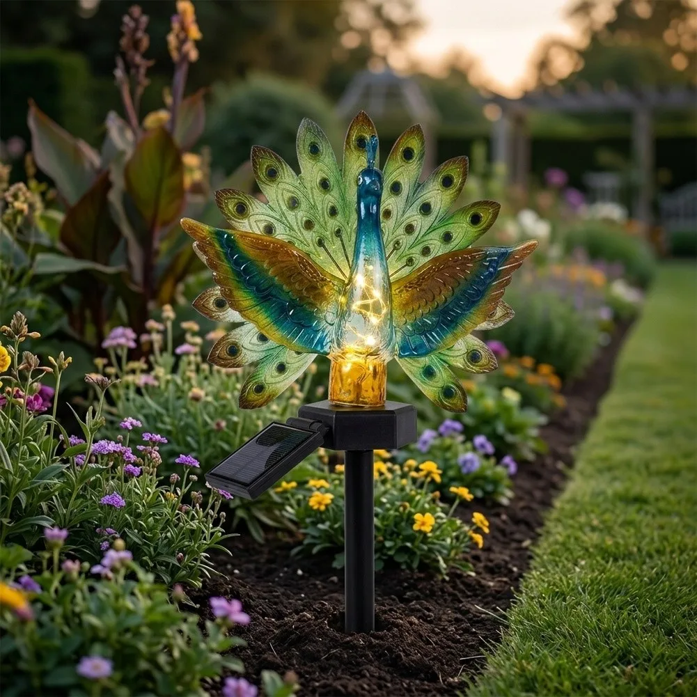 Resin Solar Peacock Garden Art with LED Illumination Triggered by Ambient Light Levels Designed for Exterior Aesthetic Use