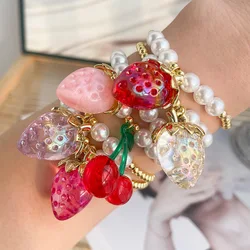 Stylish and simple resin strawberry and cherry pendant with copper and imitation pearl beaded bracelet, suitable for daily wear
