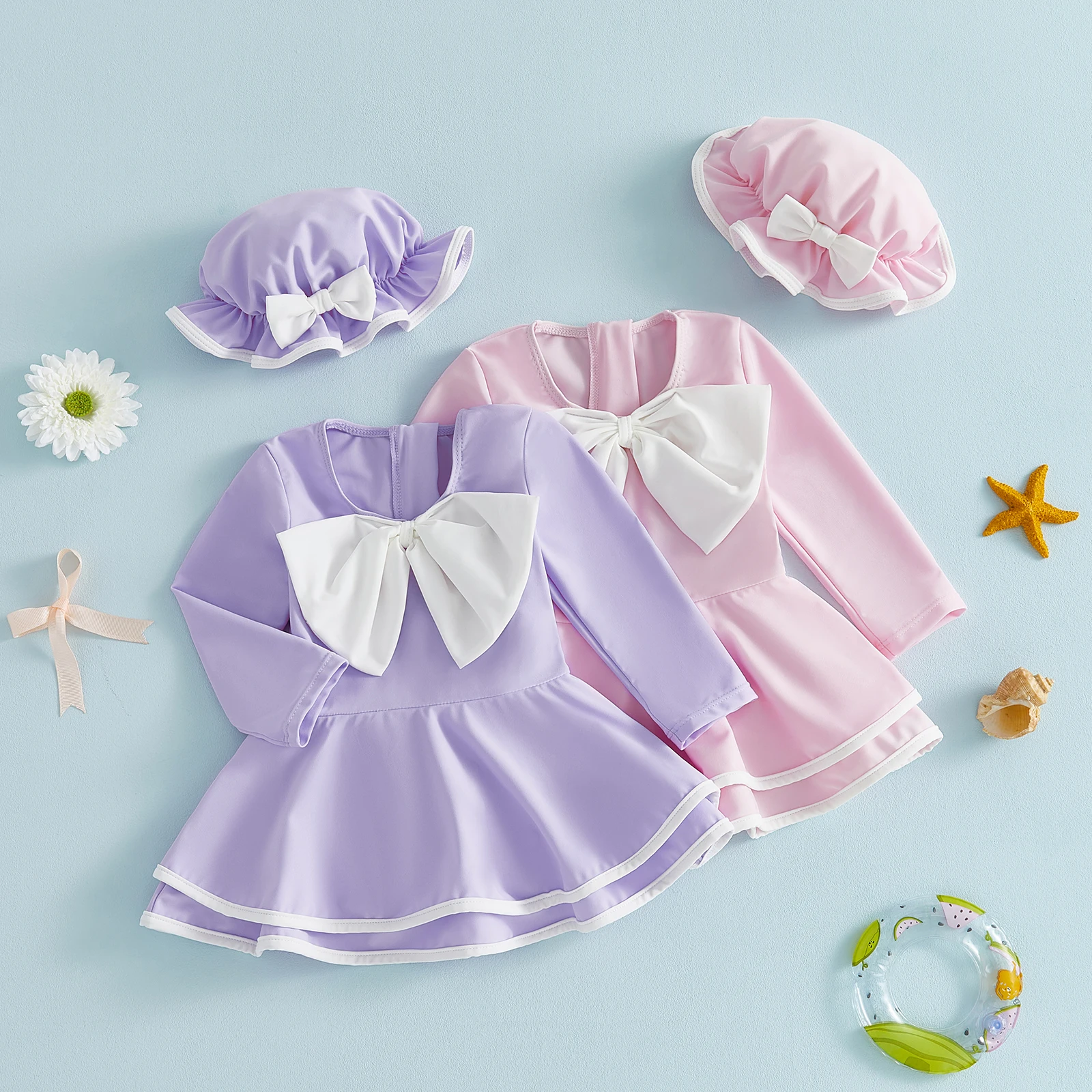 

Пляжный костюм для девочки: купальник-платье с длинным рукавом, защитой от солнца, большим бантом спереди и шляпкой от солнца