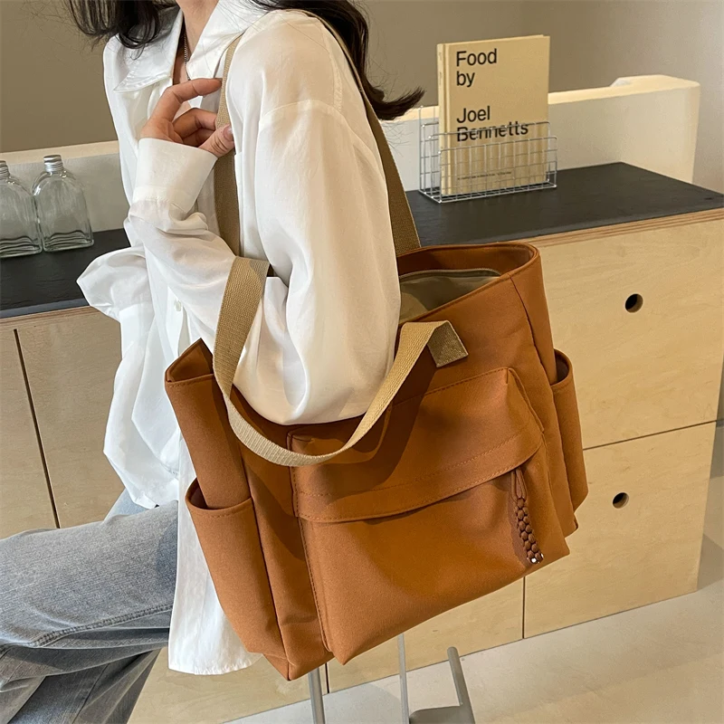 Canvas bag for women with large capacity, 2024 new casual shoulder bag, summer college student commuting tote bag