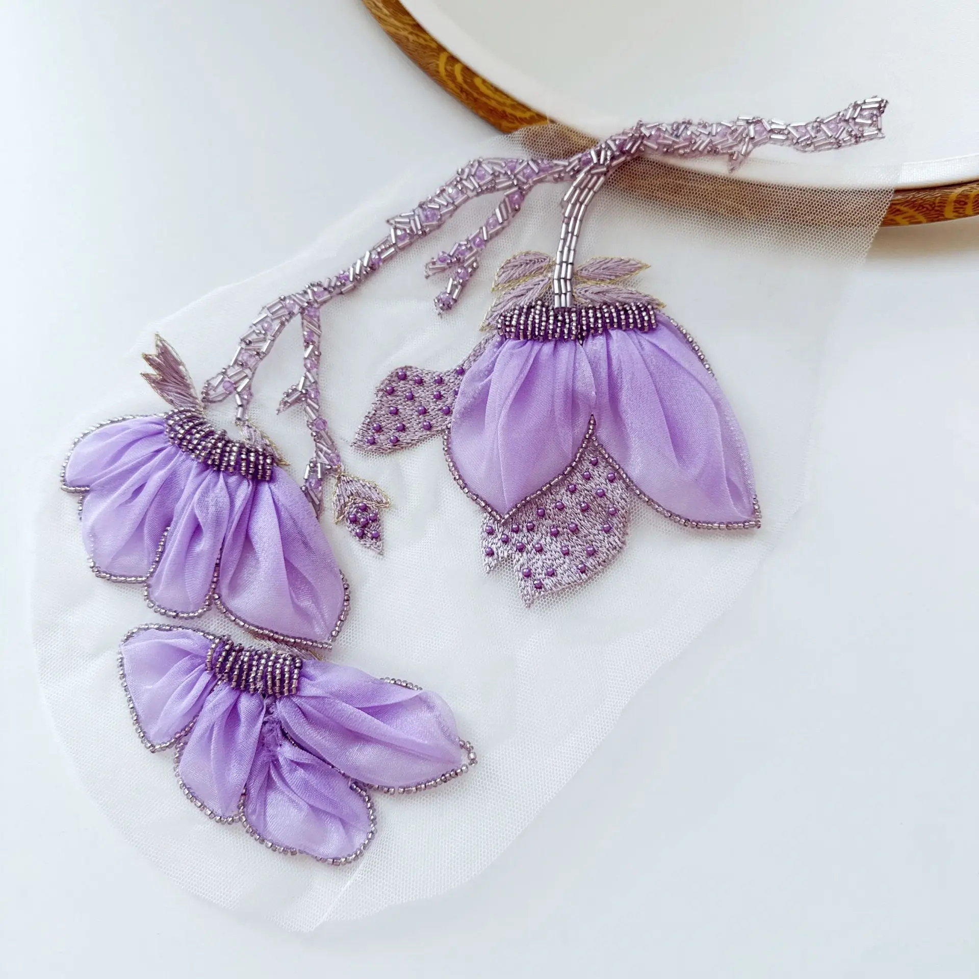 Hand-embroidered purple magnolia flower appliqué on pleated tulle dress dance costume fabric