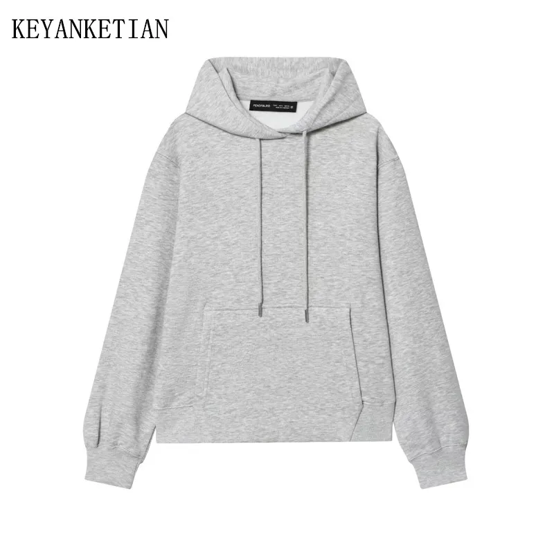 

KEYANKETIAN 2025 Winter New Women's Fleece Drawstring Hoodies Simple style Kangaroo Pocket Decoration Loose Pullover Smock Top