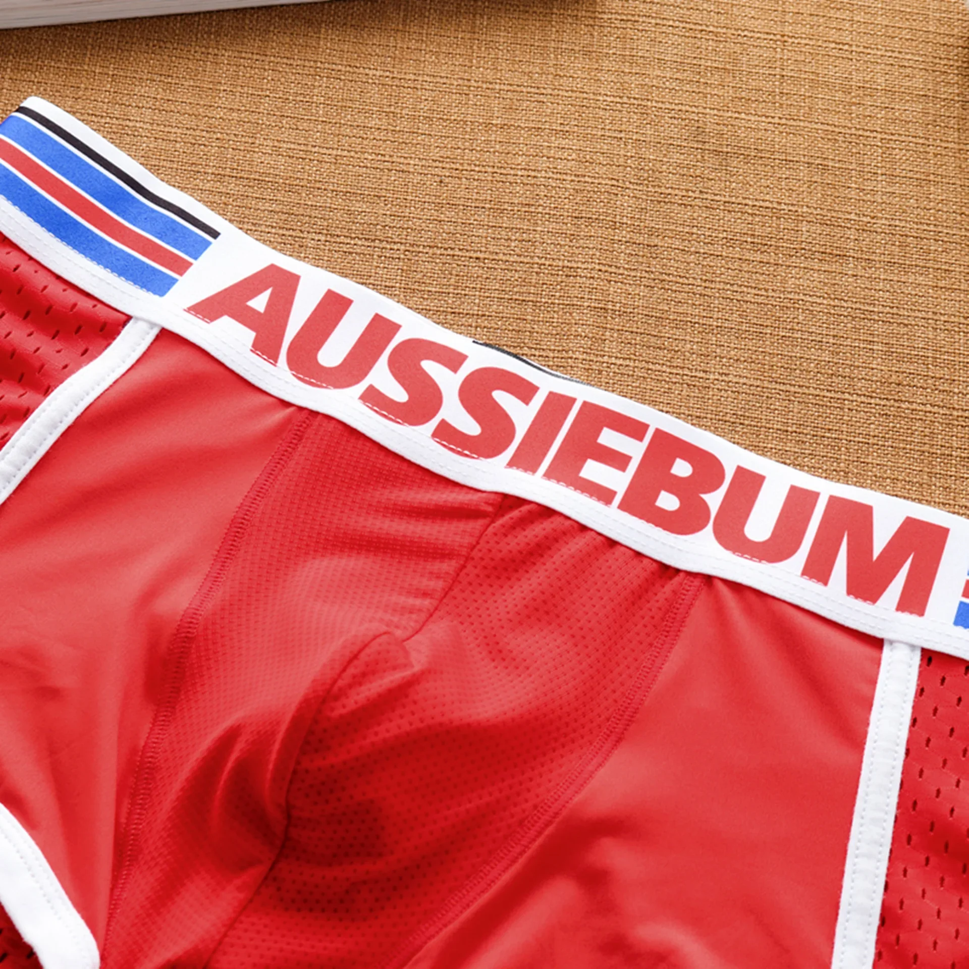 AUSSIEBUM solid-color men\'s flat-angle panties sexy mesh hole hip breathable ice silk fashion comfortable tide flat-angle pants