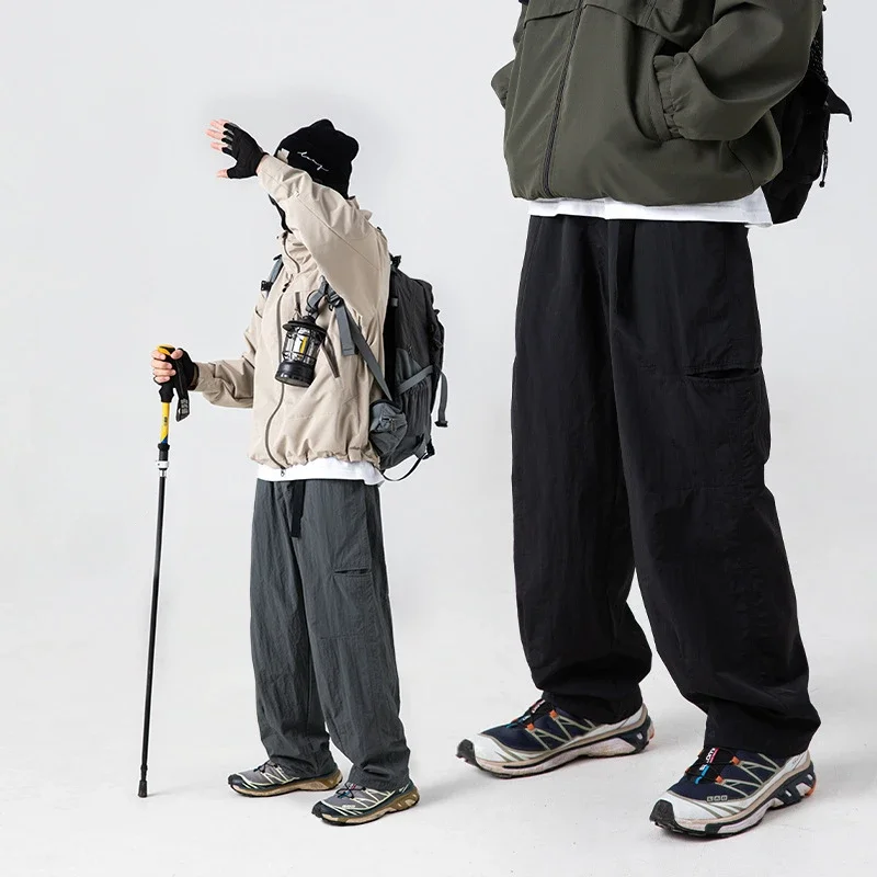 Side pockets for water splashing are designed with loose overalls and trousers sweatpants joggers men