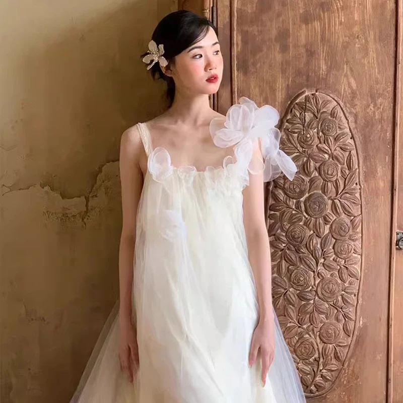 Bohemian Sheer Tulle Wedding Dress with Floral Accents Vintage Asymmetric Neckline Bridal Dress Train Beach Weddings