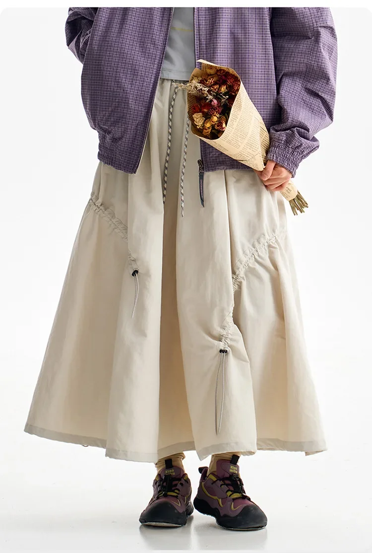 Multifunktionale Tech-Hose für Damen mit wandelbarem Saum, Tragegriff hinten, leicht, wasserabweisend, für Stadt und Outdoor, elastischer Bund. – Detail 1