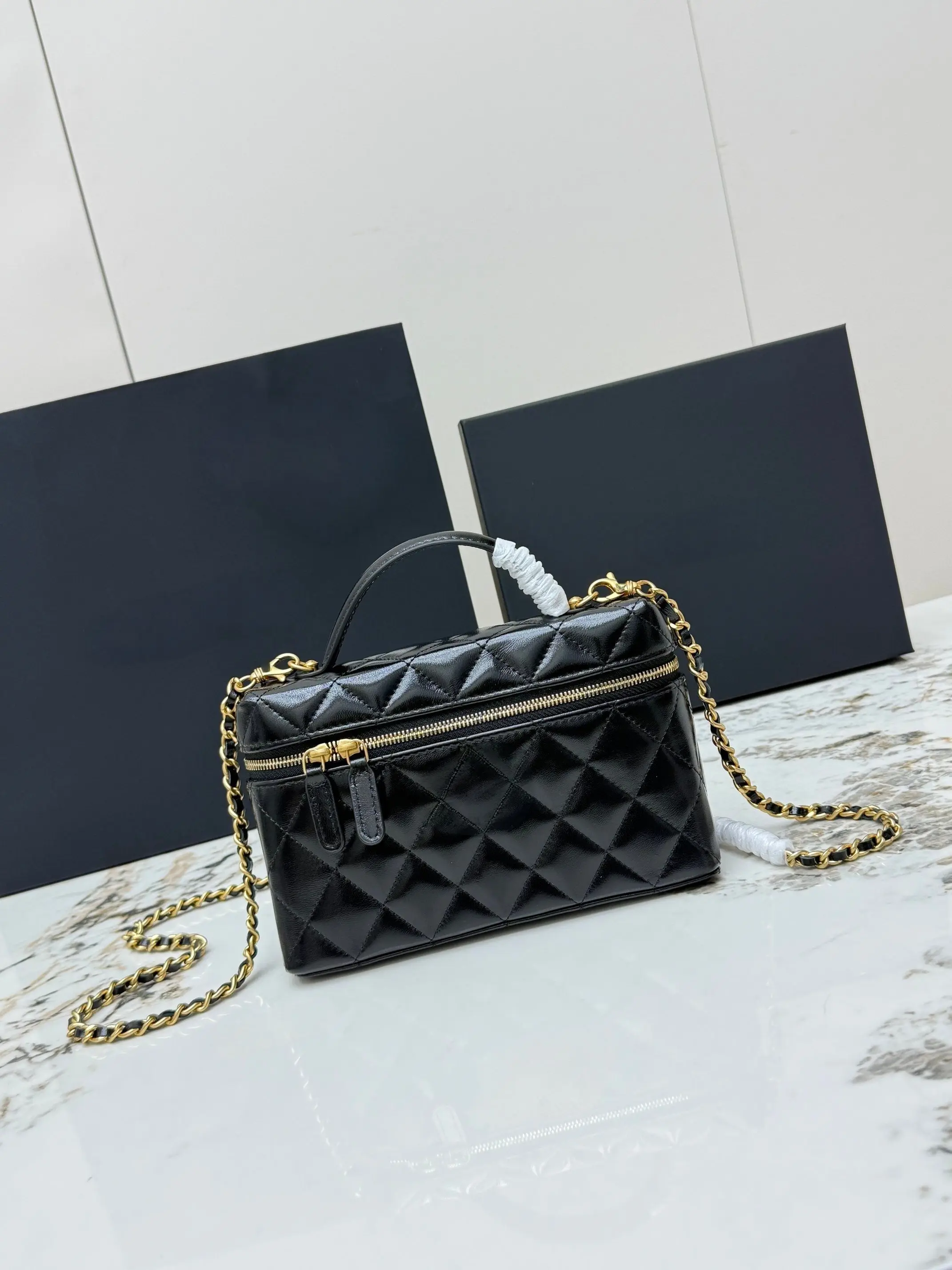 

Women's Black Mini Shoulder Bag with Top Handle, Polished Metal Details for Chic Day-to-Night Versatility