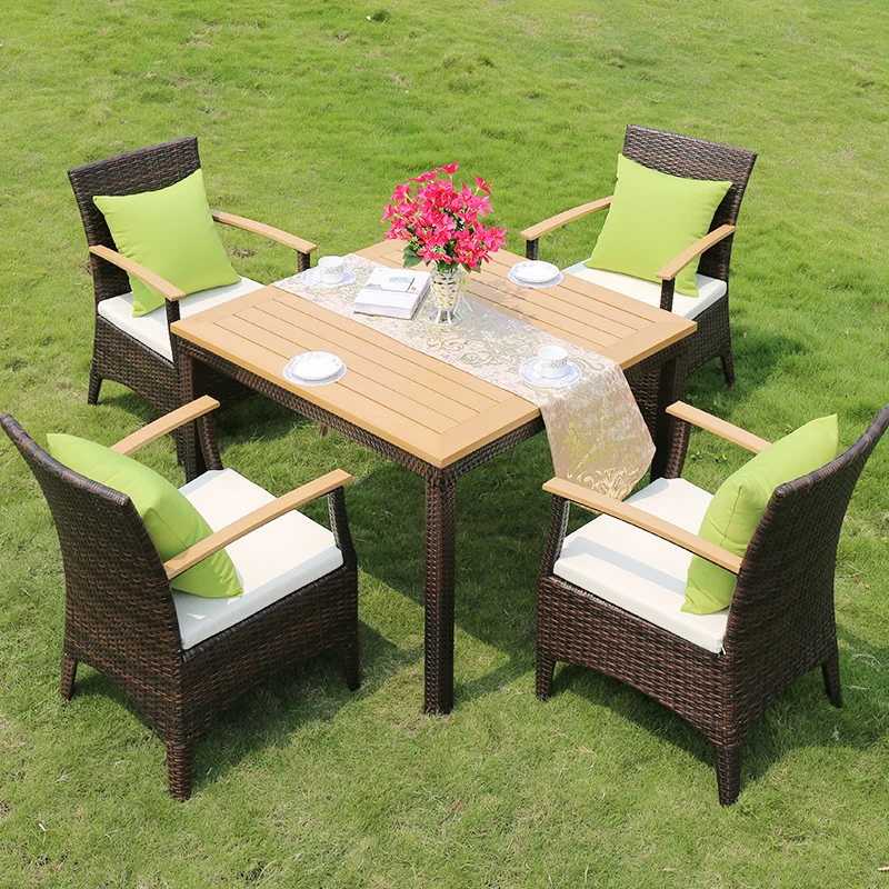 

Outdoor rattan tables and chairs plastic wood armrests tables and chairs hotel villa courtyard balcony leisure five-piece set of