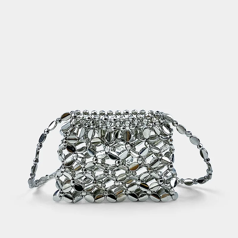 

Новая дизайнерская металлическая мини-сумка 2024 года, серебристая, ажурная, ручной работы, для наушников, через плечо