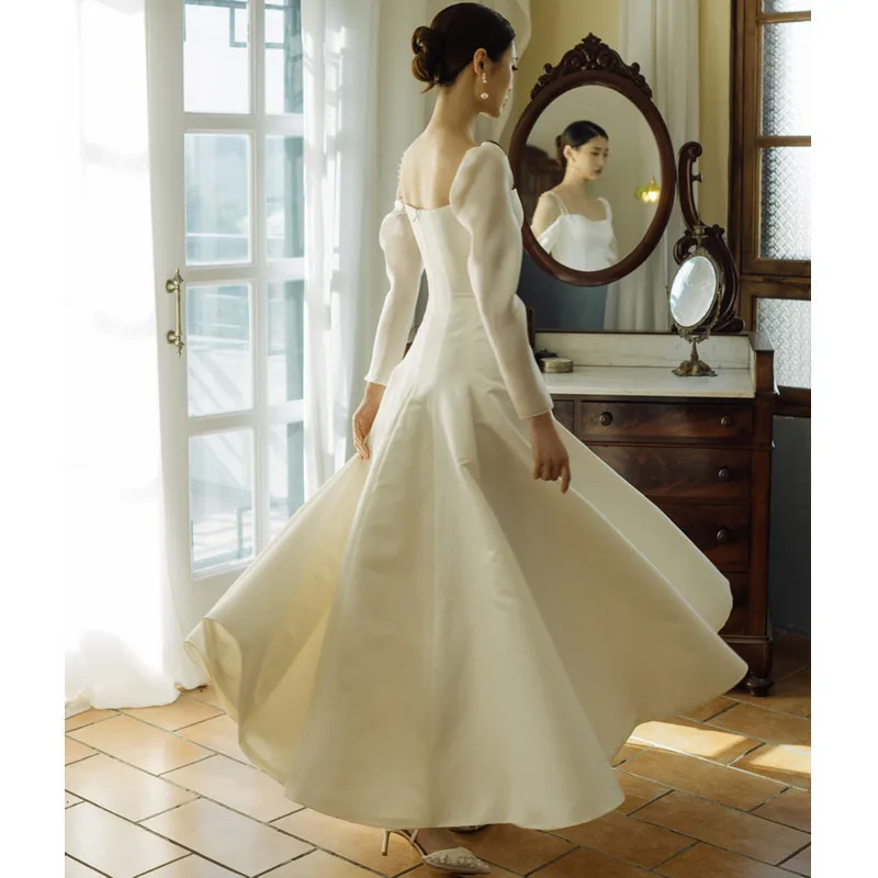 Suspender satin light wedding dress French simple travel photography bridal wedding dress retro white long-sleeved door dress