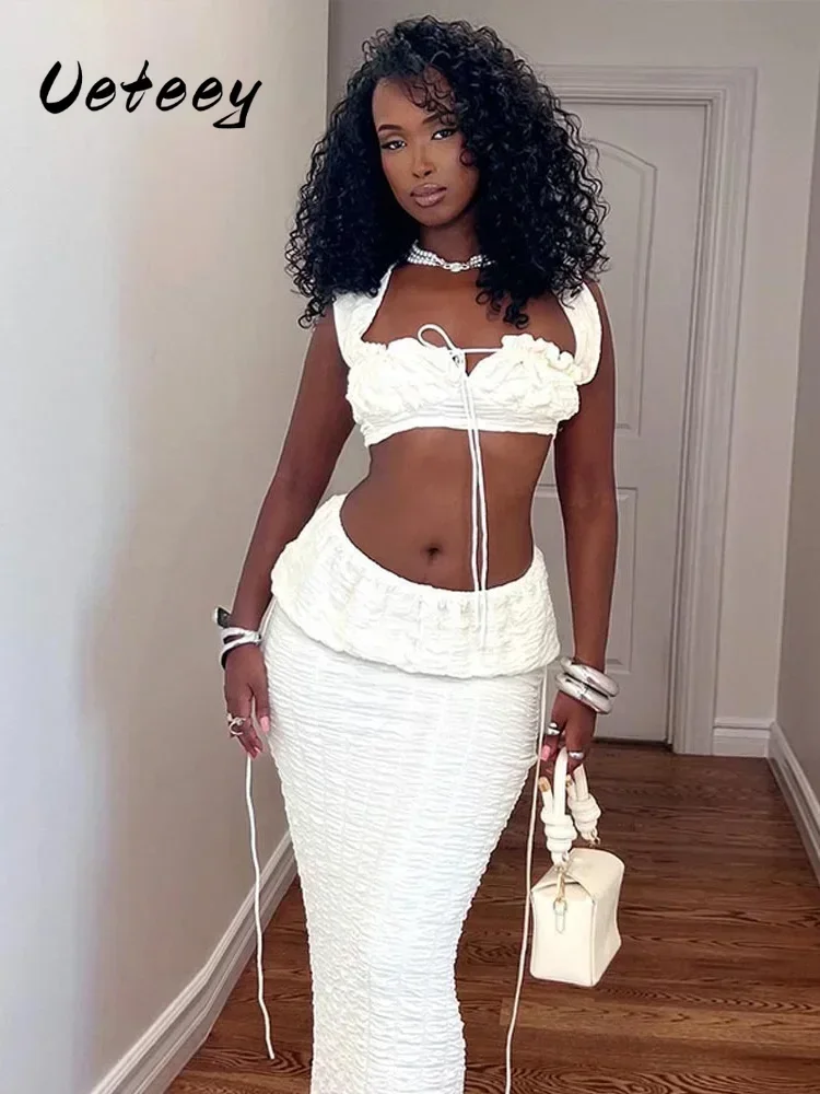 

Ueteey элегантный комплект из 2 предметов со рюшами, женские полые топы на бретелях с квадратным воротником и эластичными длинными юбками, сексуальные трендовые костюмы в полночь
