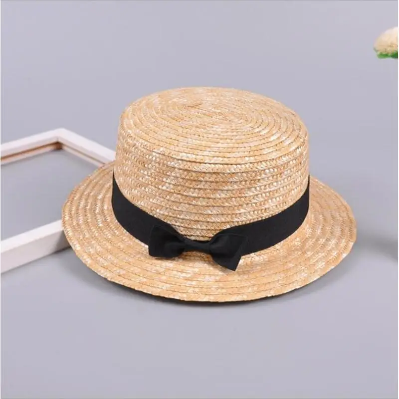 Lato rodzic-dziecko Bowknot kapelusz słońce dziewczyny słomiany kapelusz dzieci duże rondo plaża lato Boater plaża wstążka okrągły płasko zakończony słodkie dziecko — zdjęcie 2