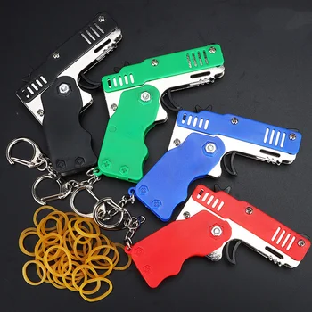 1 stücke Mini Metall Pistole Falten Gummiband Spielzeug Outdoor Sport Schlüsselbund Spielzeug 6 Platzt Gummi Pistole Kinder Geschenke Party favor Pistole Spielzeug