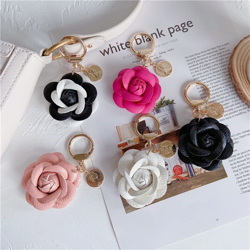 Luxury Black White Camellia Genuine Leather Flower Keychain Letter Umbrella Pendant Car Key Chain Ring Pendant For Bag Accessory