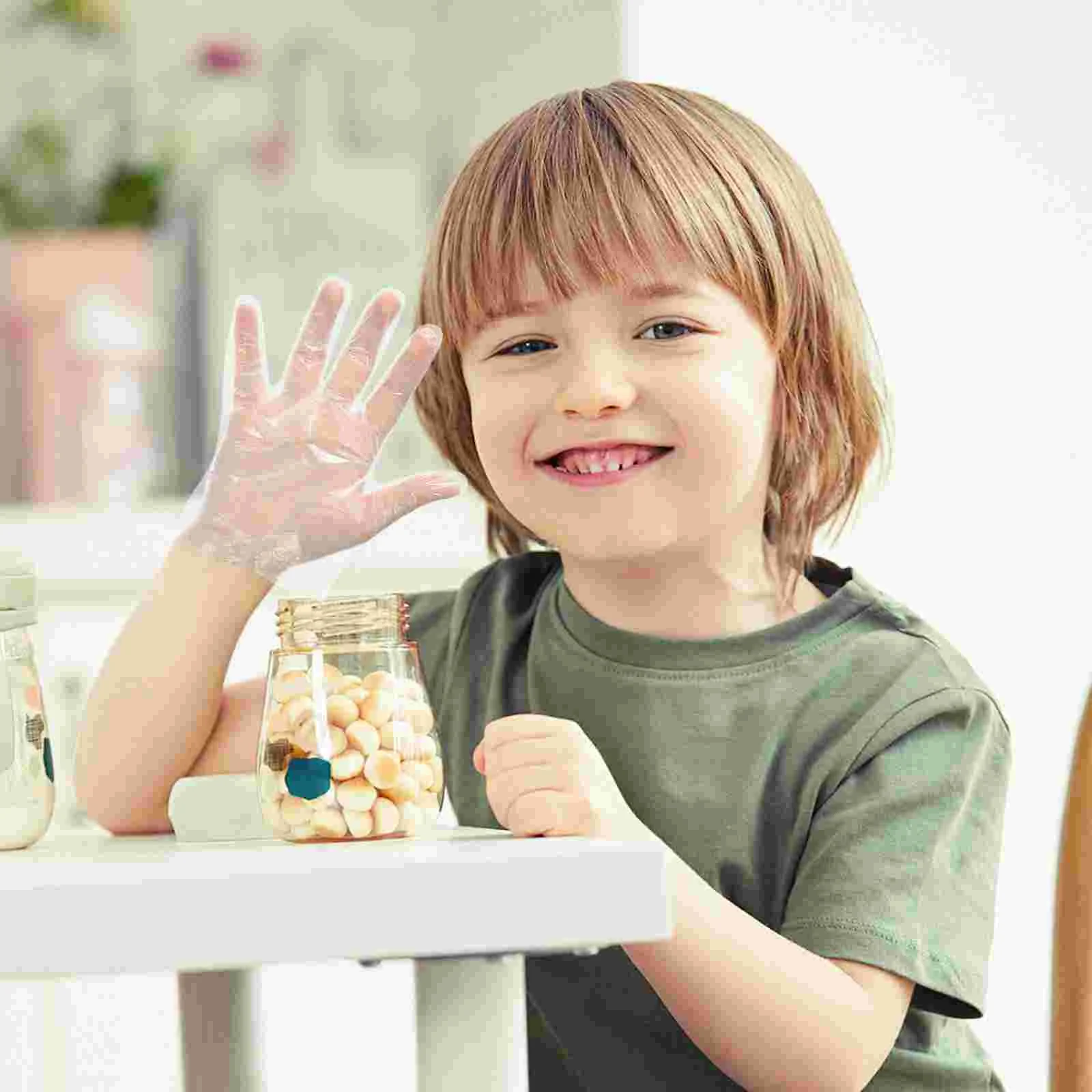 ถุงมือทําความสะอาดเด็กอิมัลชันฝาครอบป้องกันมือทางการแพทย์ไนไตรล์โปร่งใส