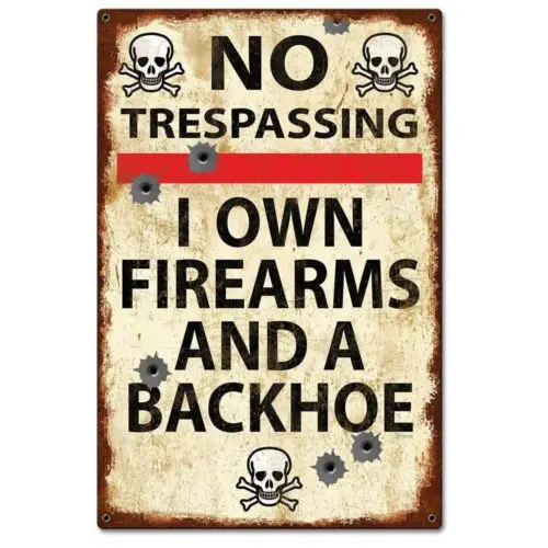 No Trespassing I own Firearms & a Backhoe Tin Sign 8 x 12