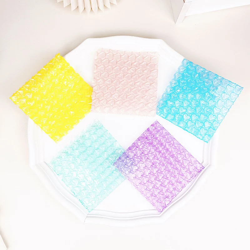 50 pz/pacco Mini Bubble Bag sacchetti di imballaggio antiurto busta di spedizione per gioielli/orecchini 10x10cm buste imbottite piccole buste regalo