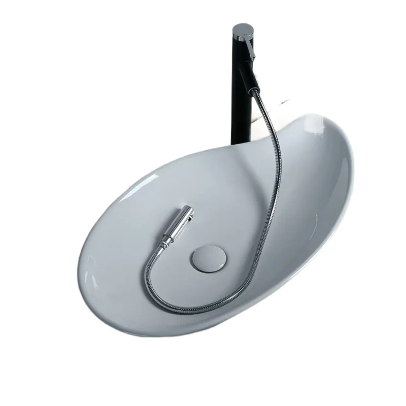 

Nordic style ceramic table wash basin household art wash tray hotel personality and creativity