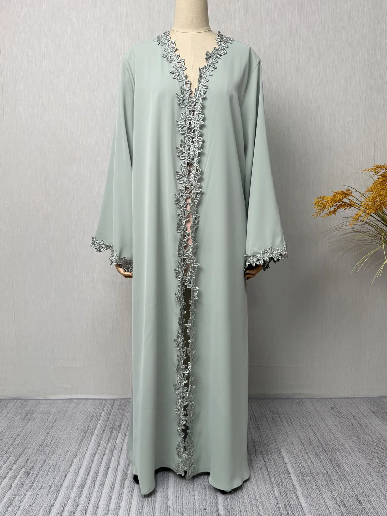 Dubai Elegant  Green Abaya for Muslim Women - Intricately Crafted with Multicolored Embroidery Piece in Islamic Modest Fashion