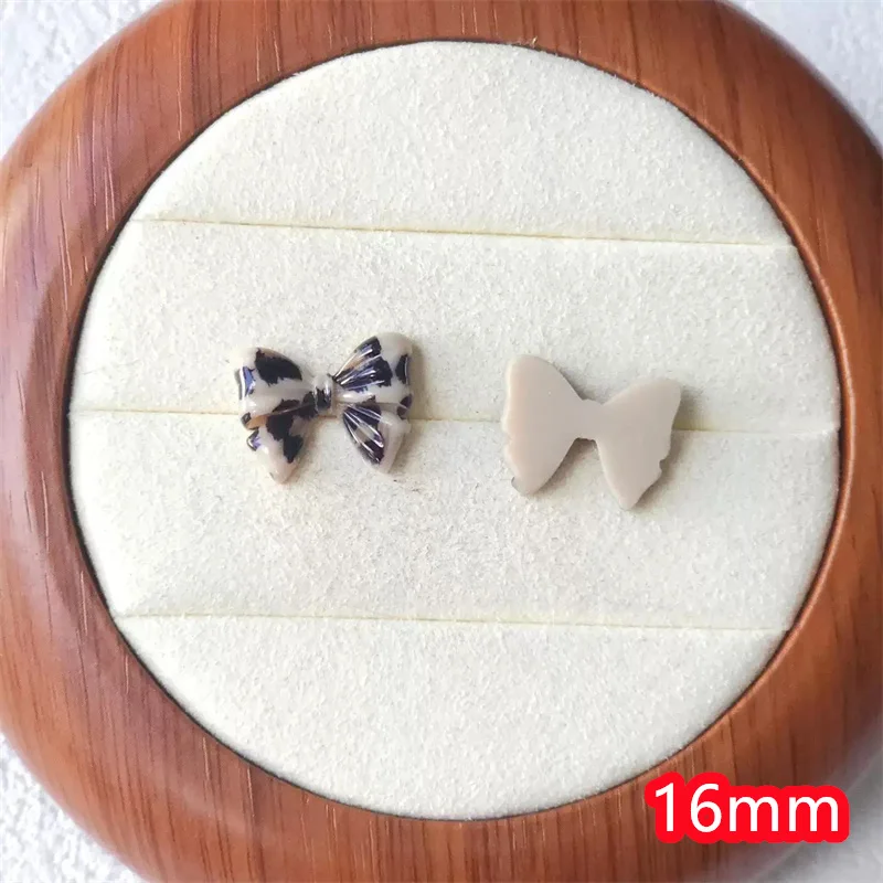 Groothandel 50 stks/partij kleur Luipaard patroon cartoon harten boogvorm hars cabochon kralen diy sieraden kledingstuk haaraccessoire