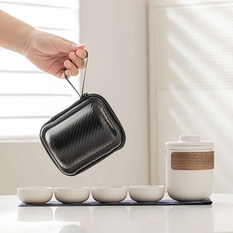

Portable travel tea sets, coarse earthenware quick guest fair cup, one pot, four cups, complete small set of souvenirs