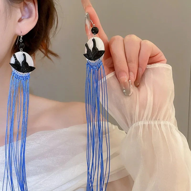 

Minar Kawail White Black Contrast Color Acrylic Round Butterfly Long Rope Chain Tassel Drop Earrings for Women Holiday Jewelry