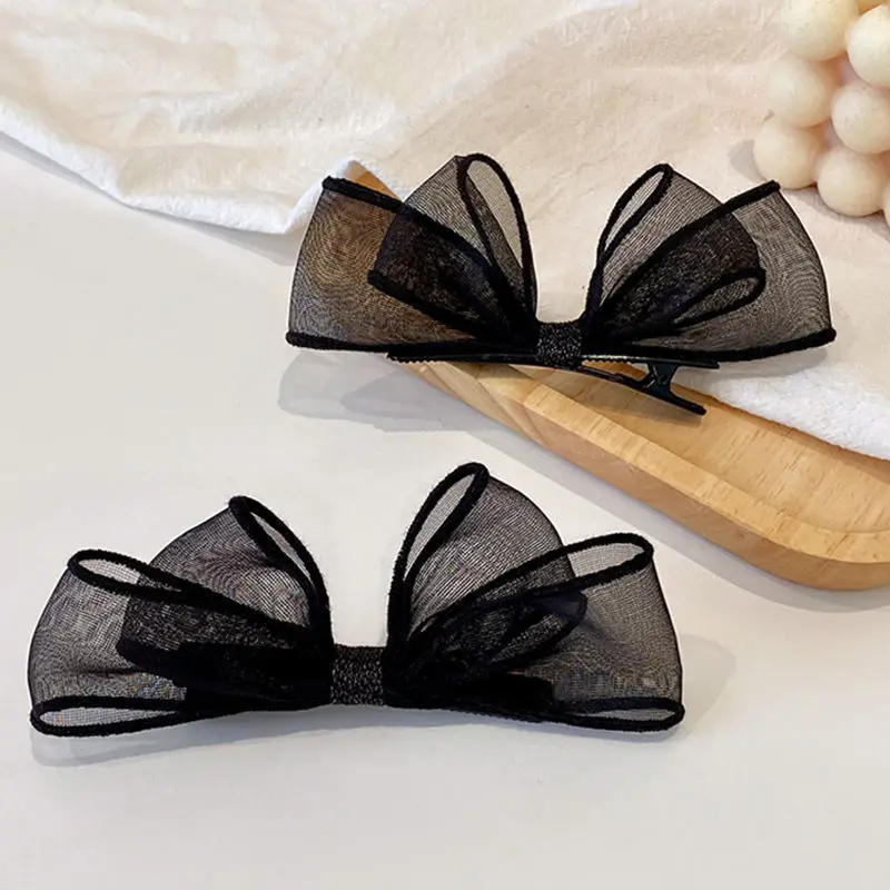 2026 Neu eingetroffen: 2er-Set elegante schwarze Haarspangen mit Schleife und Entenschnabel-Clip, modische seitliche Haarnadeln für Damen, ideal für den Alltag und Partys – Detail 4