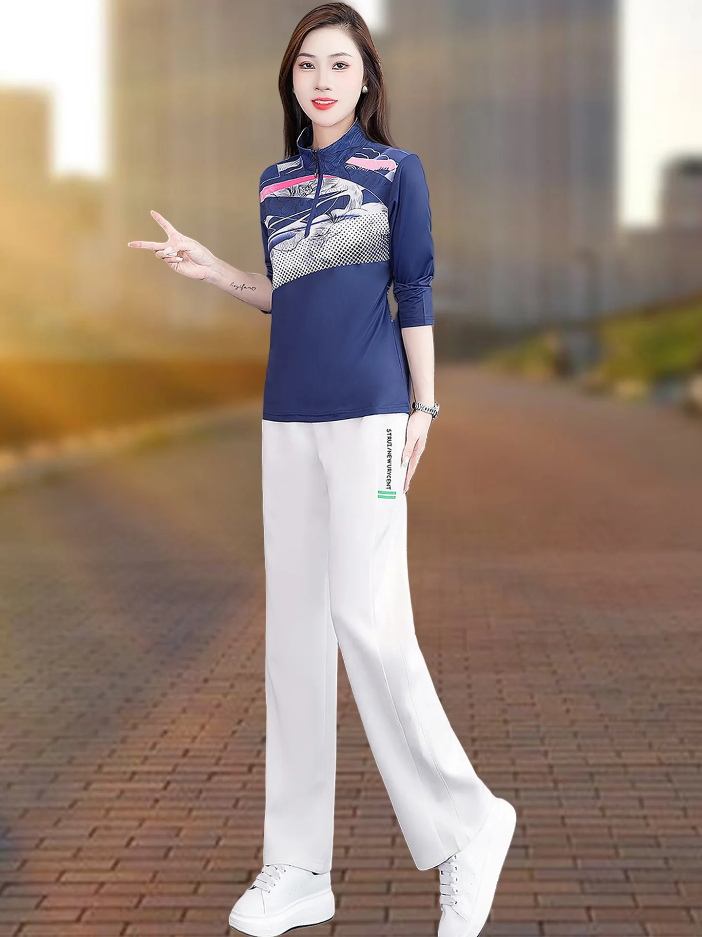 طقم ملابس رياضية من الحرير الجليدي للنساء لربيع وخريف فضفاض قابل للتنفس وياقة واقفة طويلة Sve مكونة من قطعتين كوي جاف غير رسمي...